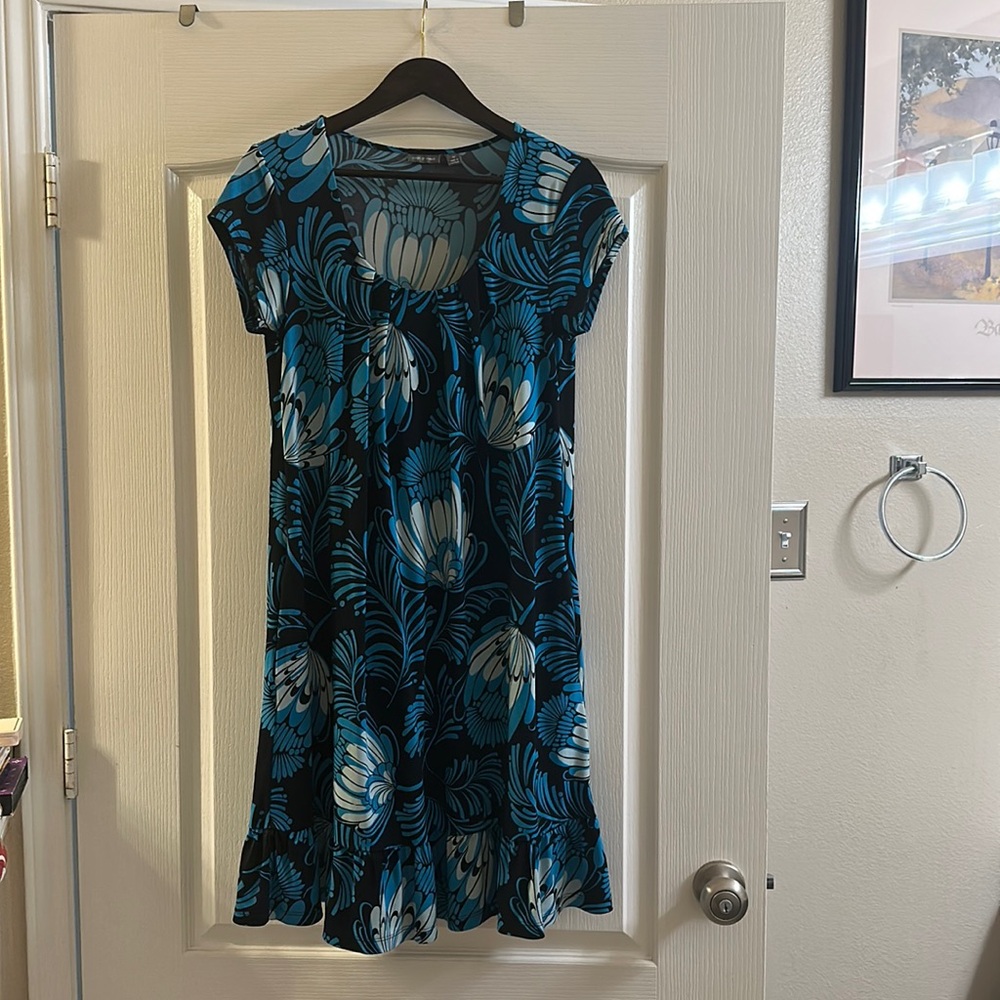 Two shades of blue, Black.  Ruffled bottom.